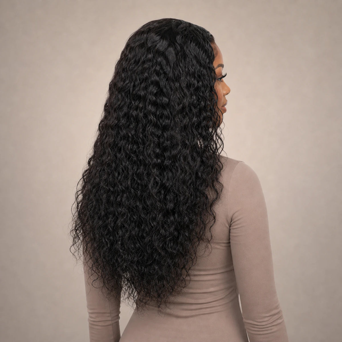 Natural Black Water Wave human hair wig texture and fall shown from the back