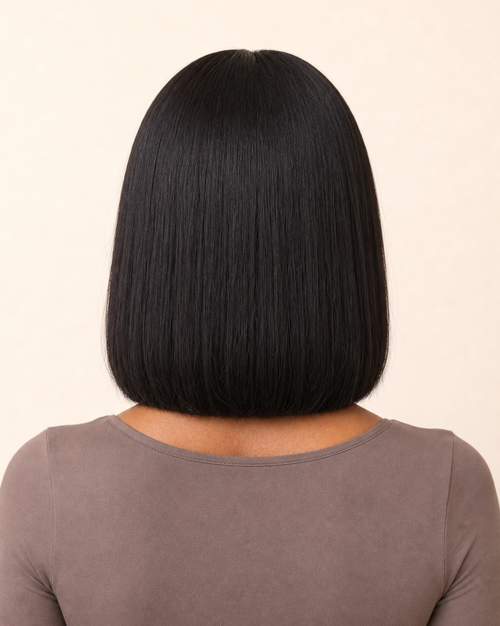 Natural black bone straight lace front bob human hair wig shown from the back